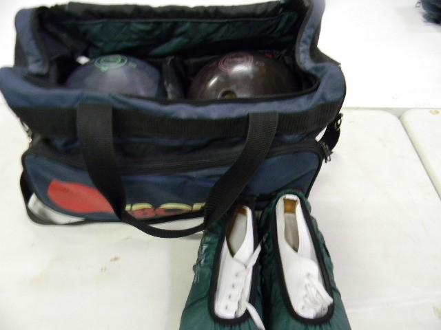 lot 82 image: Bowling bag on wheels containing tw...