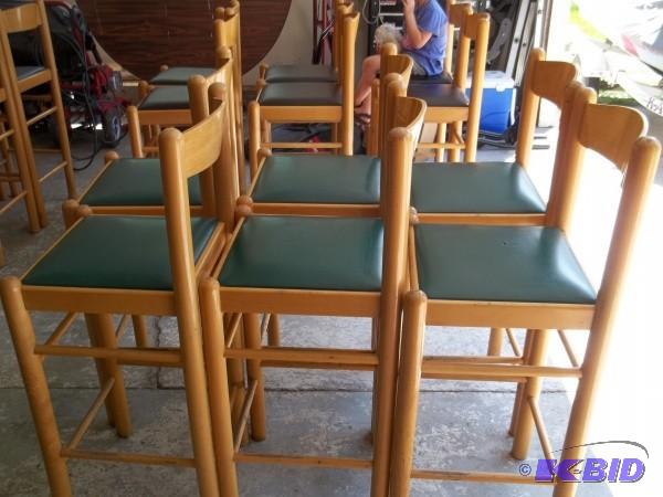 A set of 6 vinyl bar stools, green ...
