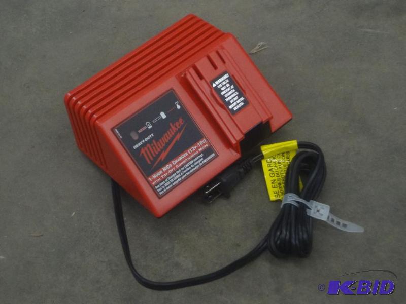 lot 121 image: Milwaukee 12-18Volt Charger...
