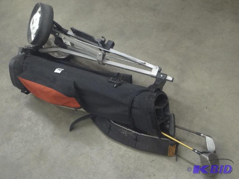 lot 58 image: Golf Bag Caddy With Bag & Clubs...
