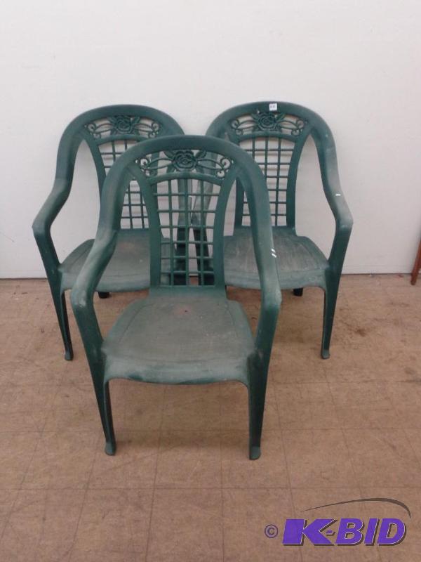 lot 110 image: (3) Green Plastic Patio Chairs Flor...