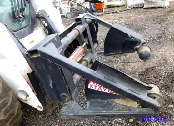 lot 10 image: Universal Mount Bobcat Skid Loader ...