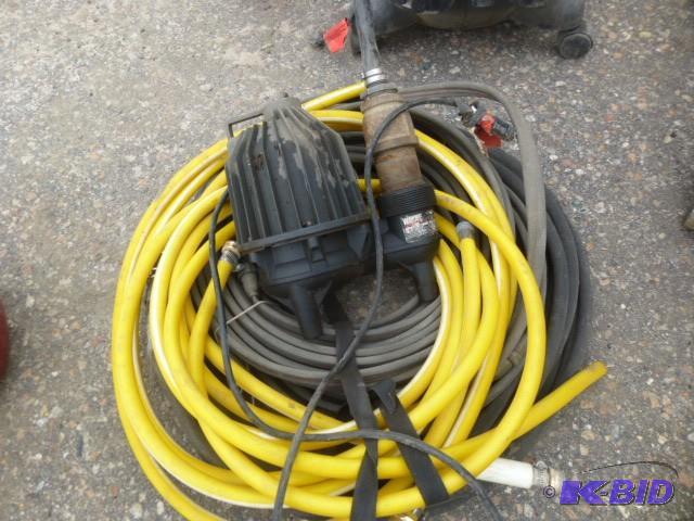 lot 59 image: Wayne Brand Sump Pump With Hoses Co...