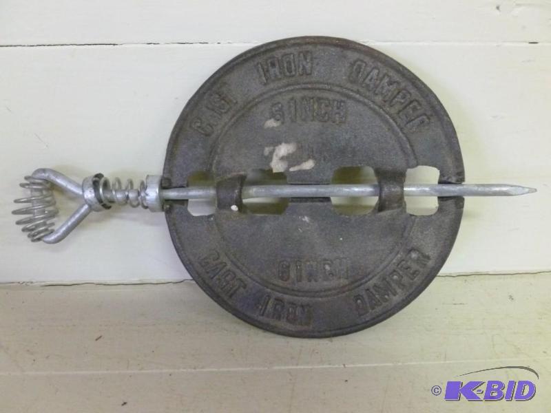 lot 273 image: Decorative cast iron stove damper t...