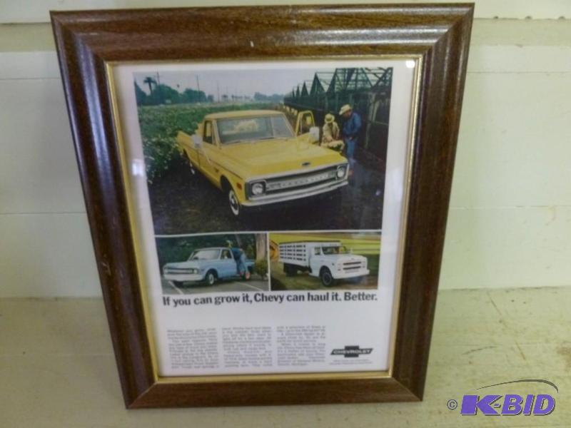 lot 276 image: Vintage Chevy Trucks wood framed ad...