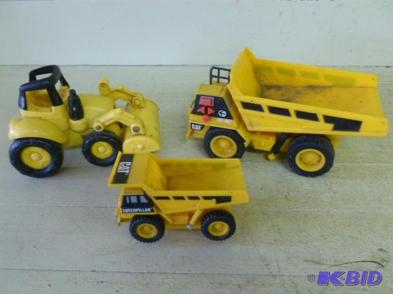 lot 300 image: Lot of three sand box toys that inc...