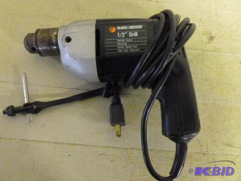 lot 73 image: Black & Decker 12" variab...