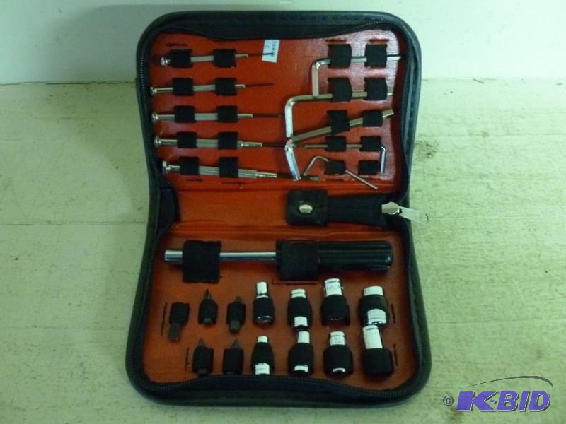 lot 77 image: Twenty-four piece portable tool set...
