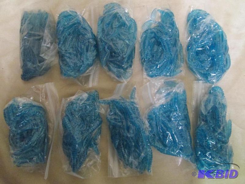 Lot of 10 bags of 6 jig worms. Rasp...