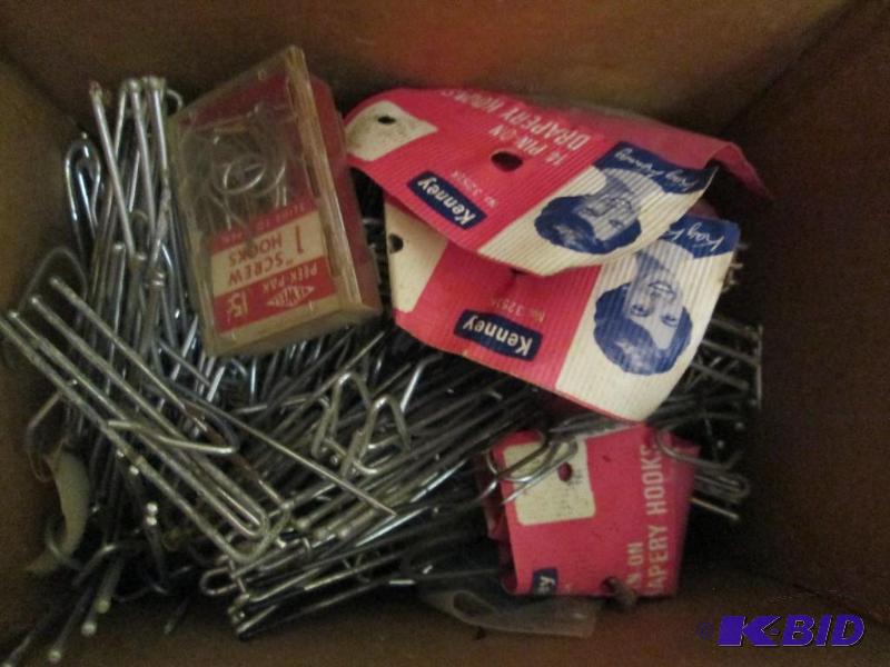 Lot of curtain hooks in various sty...