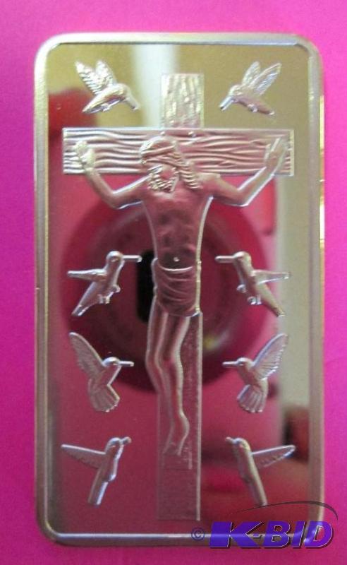 Gold piece depicting Jesus on the c...
