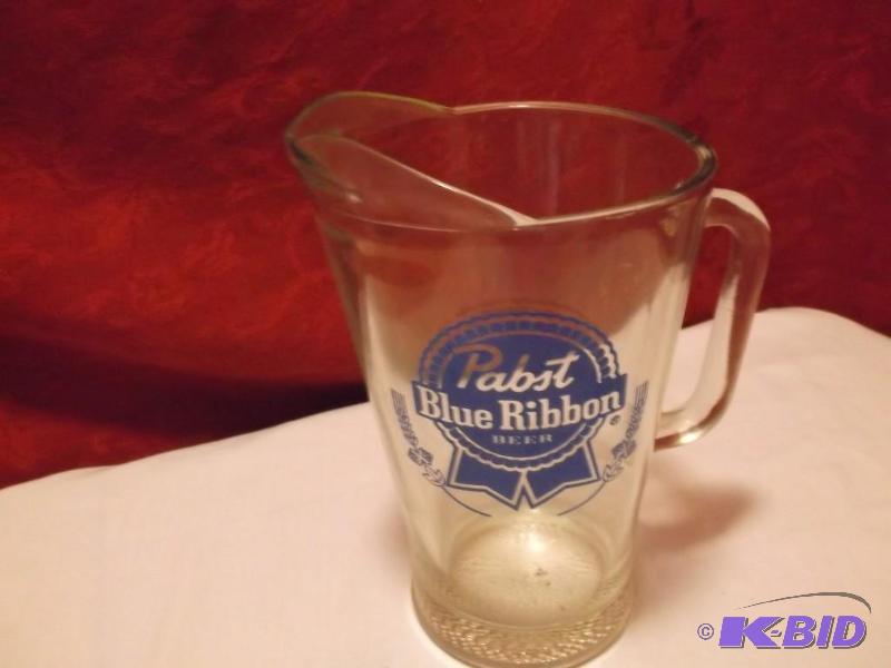lot 23 image: Large glass Pabst Blue Ribbon pitch...