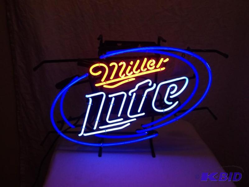 lot 32 image: Large NEON MILLER LIGHT SIGN has a ...
