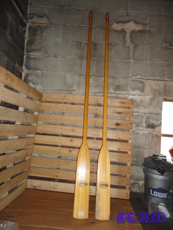 2 wooden boat paddles or oars,...