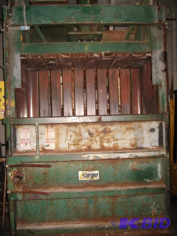 Green Hydraulic Baler. Made by Kar...