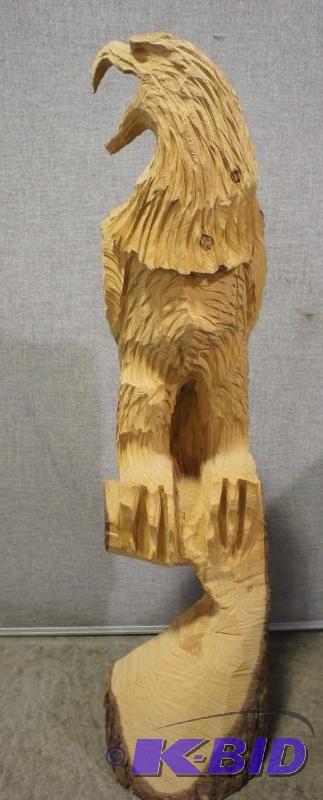 lot 1 image: Perched Eagle hand made out of a wo...