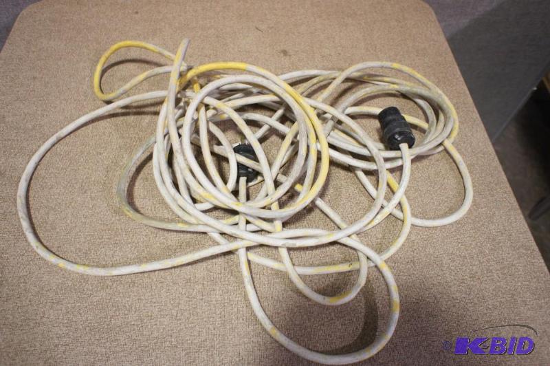 lot 15 image: Extension cord. Please see pictures...