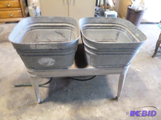 lot 180 image: Double Wash Tubs With legs and whee...