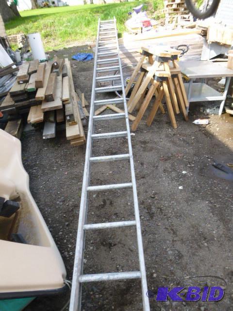 lot 21 image: 38 Aluminum Extension Ladder...