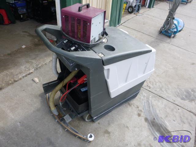 lot 49 image: Minuteman Floor Scrubber With charg...
