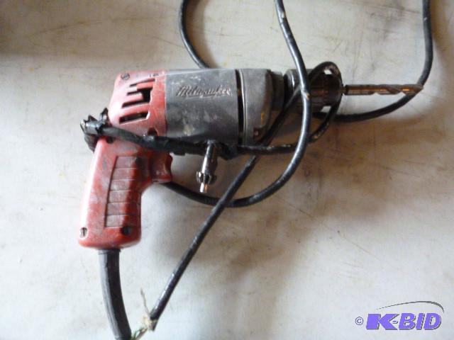 lot 75 image: Milwaukee Electric Drill 38" ...