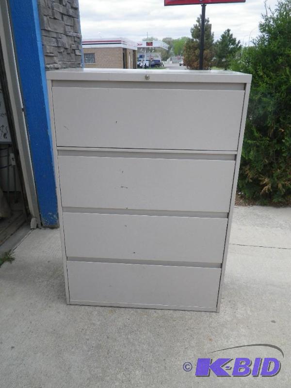 lot 15 image: Large 4 drawer file cabinet with ke...