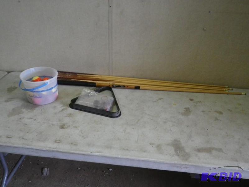 lot 24 image: 5 Pool cues, balls and rack...