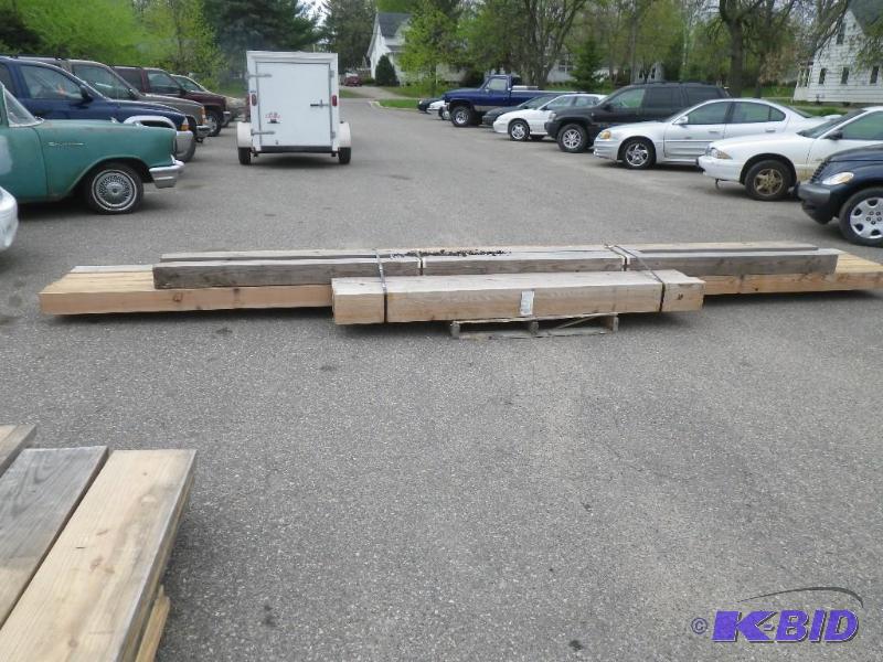 lot 43 image: Skid of new pole barn building lumb...