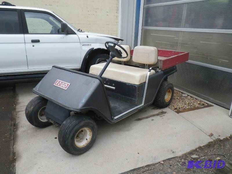lot 9 image: EZ Go golf cart, gas engine, has be...