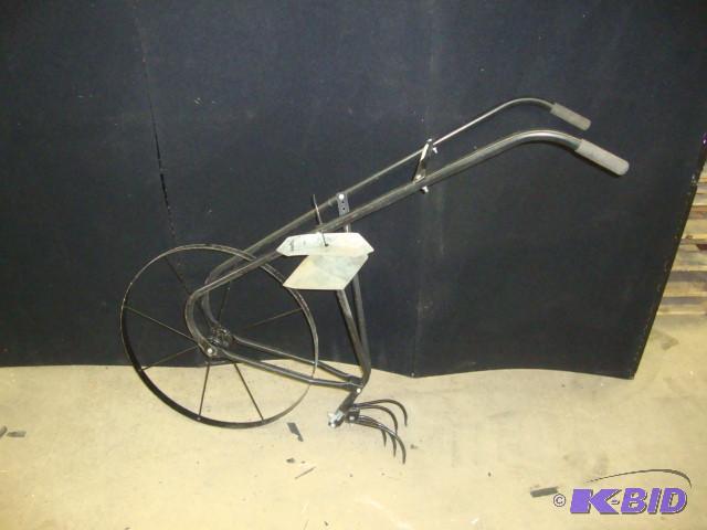 lot 40 image: High Wheel Cultivator with Blades...