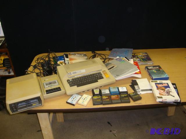 lot 49 image: Vintage Atari Computers with Manual...