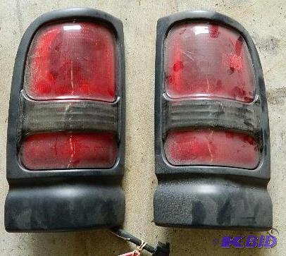 lot 103 image: 1998 Dodge Ram Tail lights. Please ...