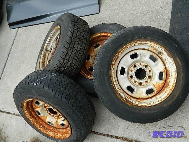 lot 171 image: Camaro 14" Rims  Tires are ba...