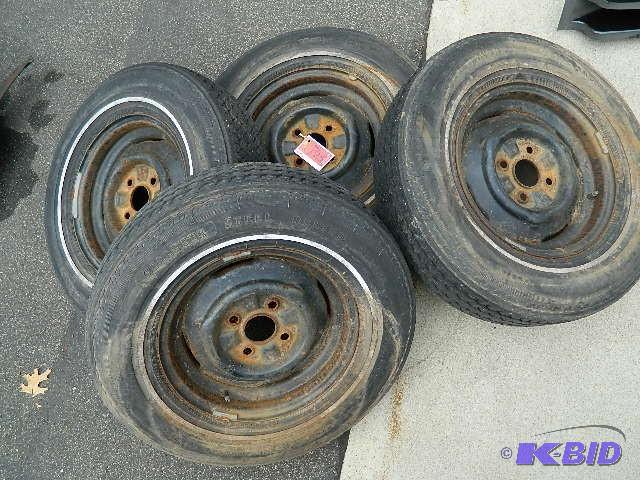 lot 175 image: Tires on 14" Rims for a Mustan...
