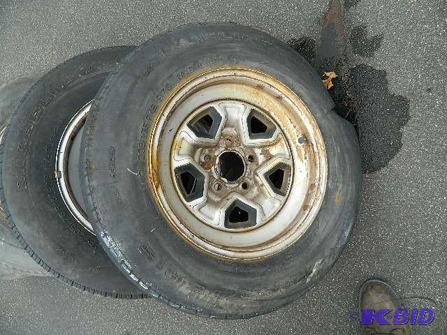 lot 176 image: Tires on 14" Rims for Camaro. ...