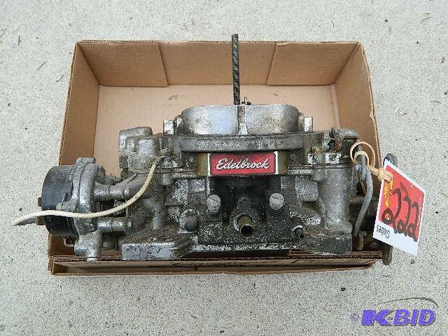 lot 222 image: EdelBrock 4 barrel Carburetor Unive...