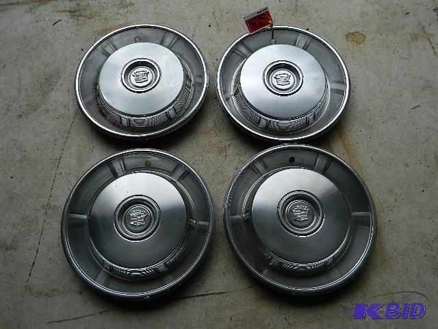 lot 23 image: 1966 Cadillac Wheel covers for 15&q...