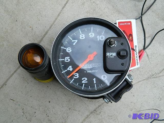 lot 98 image: Auto Meter Tachometer. Please see p...