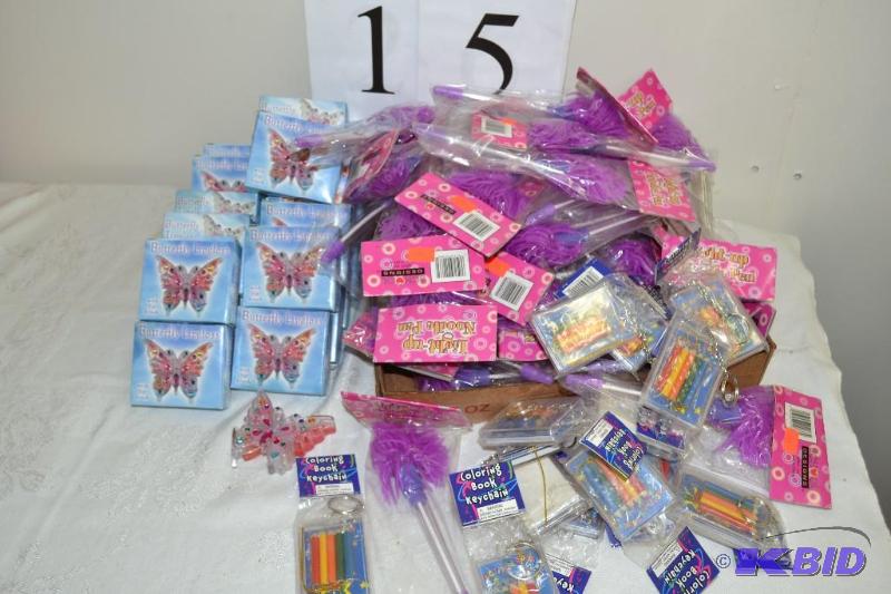 lot 15 image: Lip gloss, pen, key chains