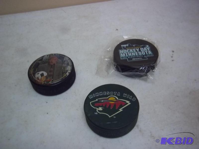 Lot Of Minnesota Hockey Pucks...