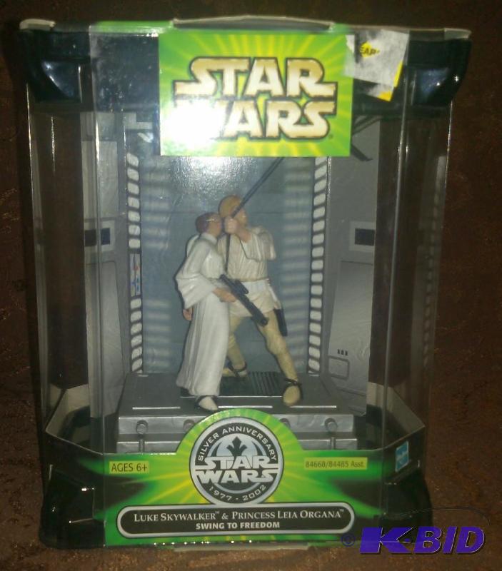 lot 4 image: Luke Skywalker & Princess Leia Organa Swi...