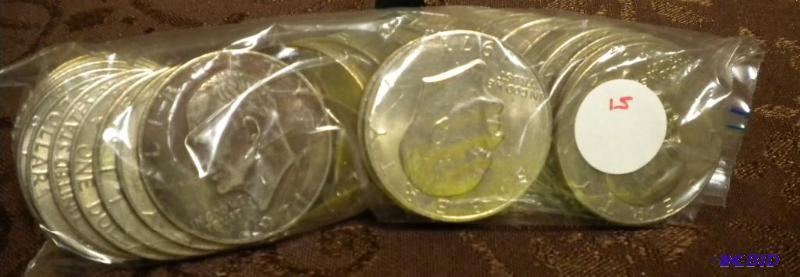 lot 15 image: BAG OF 25 IKE DOLLAR ONE DOLLAR COI...
