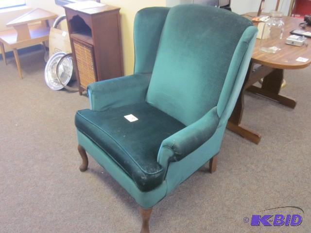 lot 118 image: Upholstered wing back green chair i...