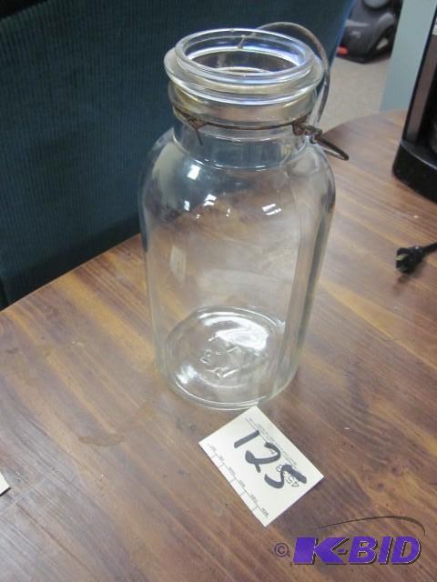 lot 125 image: Large glass jar marked Anchor Hocki...