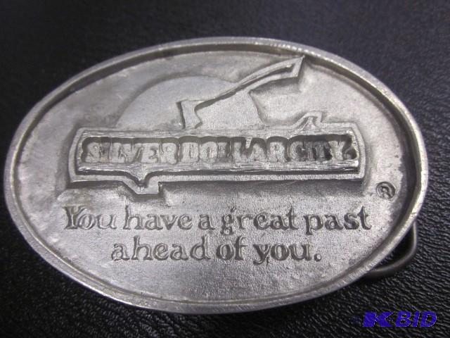 lot 24 image: Silver Dollar City solid pewter bel...