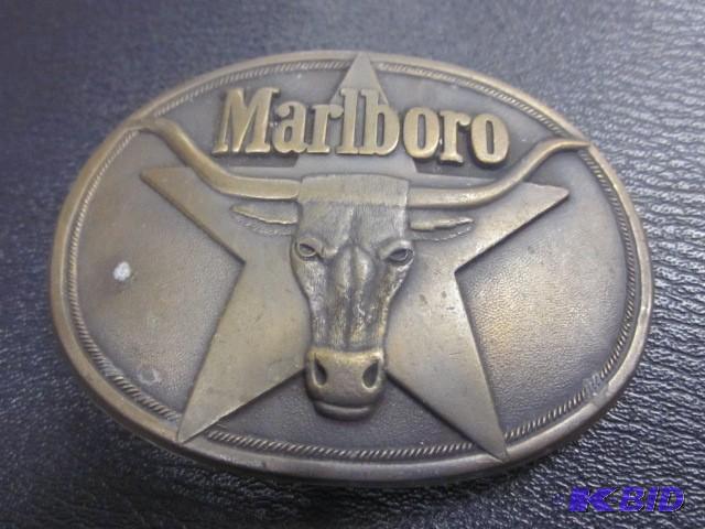 lot 42 image: 1987 Philip Morris solid brass Marl...