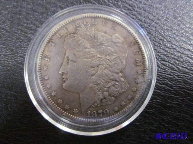 lot 5 image: 1879 Morgan Silver Dollar....