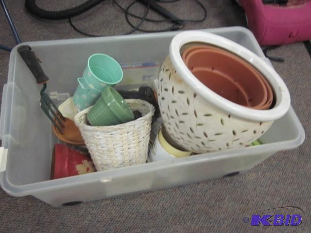 lot 87 image: Bin full of gardening supplies, inc...
