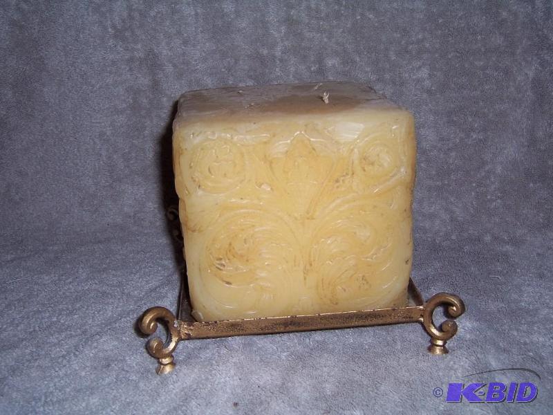 Candle on metal base