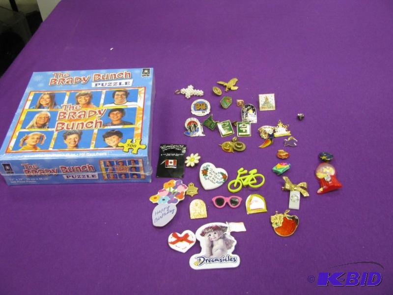 brady bunch puzzel and misc pinback...